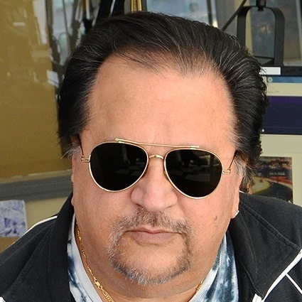 Head shot photo of Albie Dee